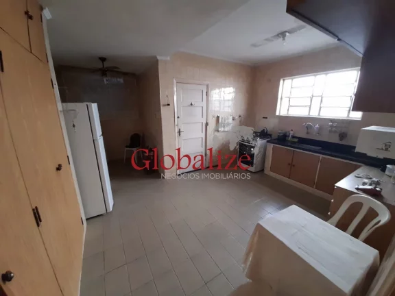 Imagem Casa com 3 dormitórios e 2 vagas à venda no Macuco em Santos R$ 900.000,00