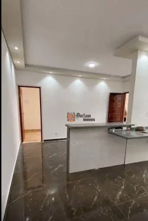 Imagem Casa com 2 dormitórios à venda, 100 m² por R$ 375.000 - Caiçara - Praia Grande/SP