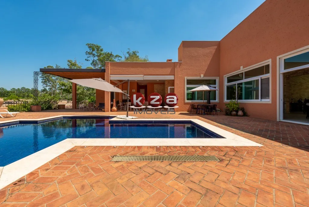 Imagem Luxuosa mansão de alto padrão a venda no Condomínio Terras de São José em Itu- SP, com 5 suítes, amplo gourmet com piscina e 1.500m² de área.