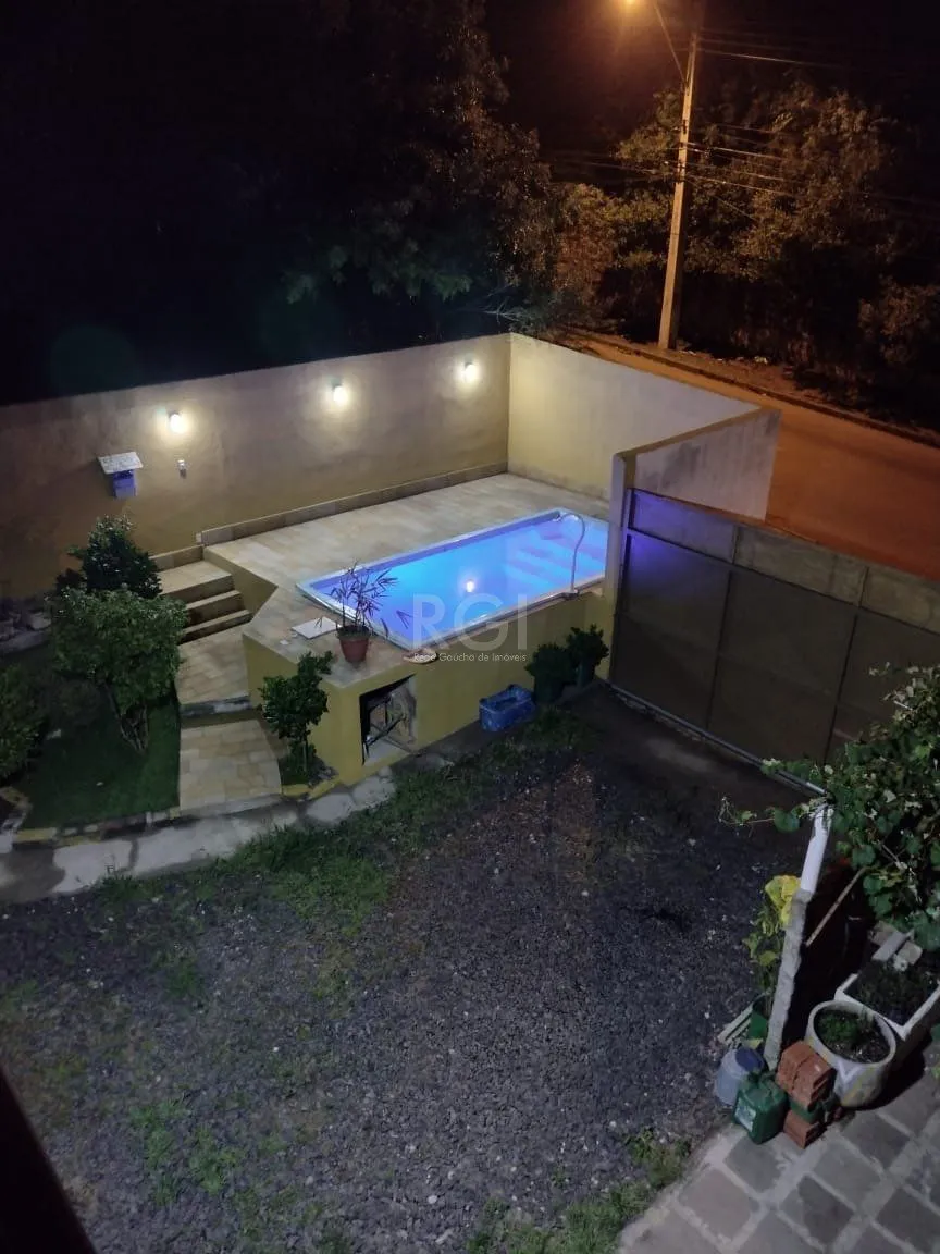 Imagem Casa para Venda - 0.18m², 2 dormitórios, sendo 2 suites, 3 vagas - Lomba do Pinheiro