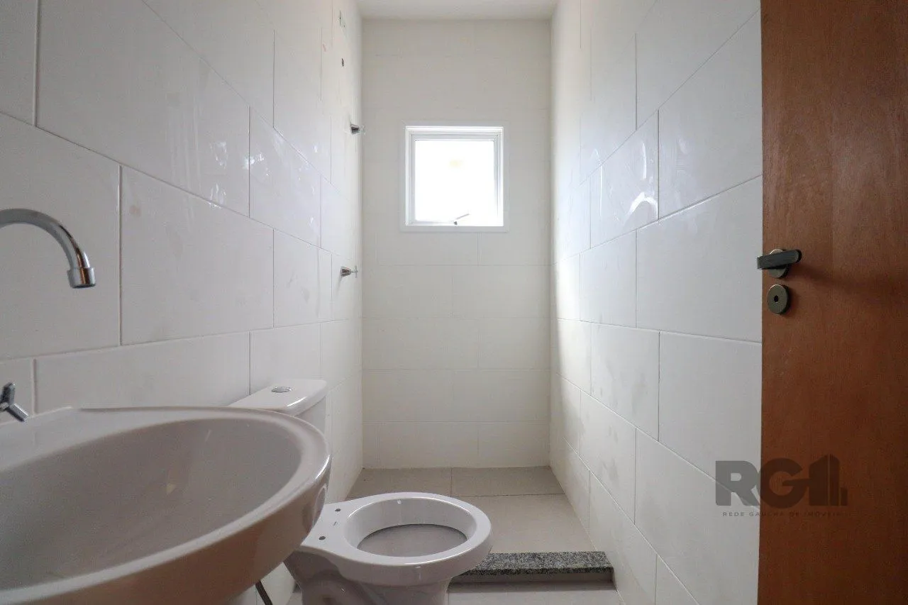 Imagem CASA ESTILO SOBRADO COM 2 QUARTOS E PÁTIO, À VENDA NO BAIRRO VILA NOVA, EM PORTO ALEGRE/RS