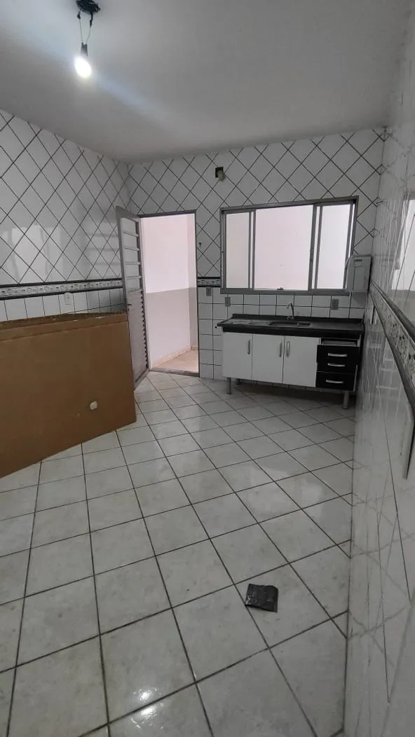 Imagem Sobrado com 4 Dormitórios e Terraço Gourmet em Localização Privilegiada