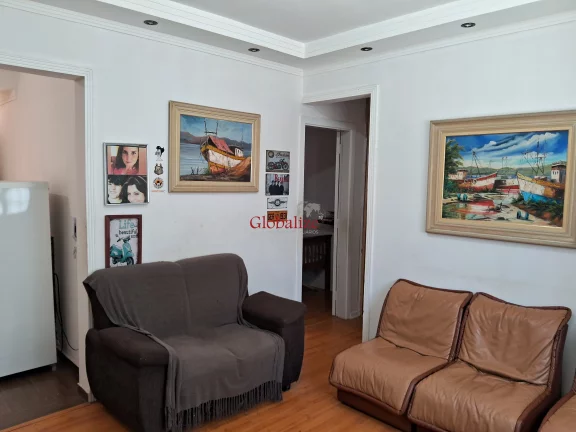 Imagem Apartamento térreo de fundos de 1 dormitório para reforma em Santos no Embaré à venda por R$ 325.000,00