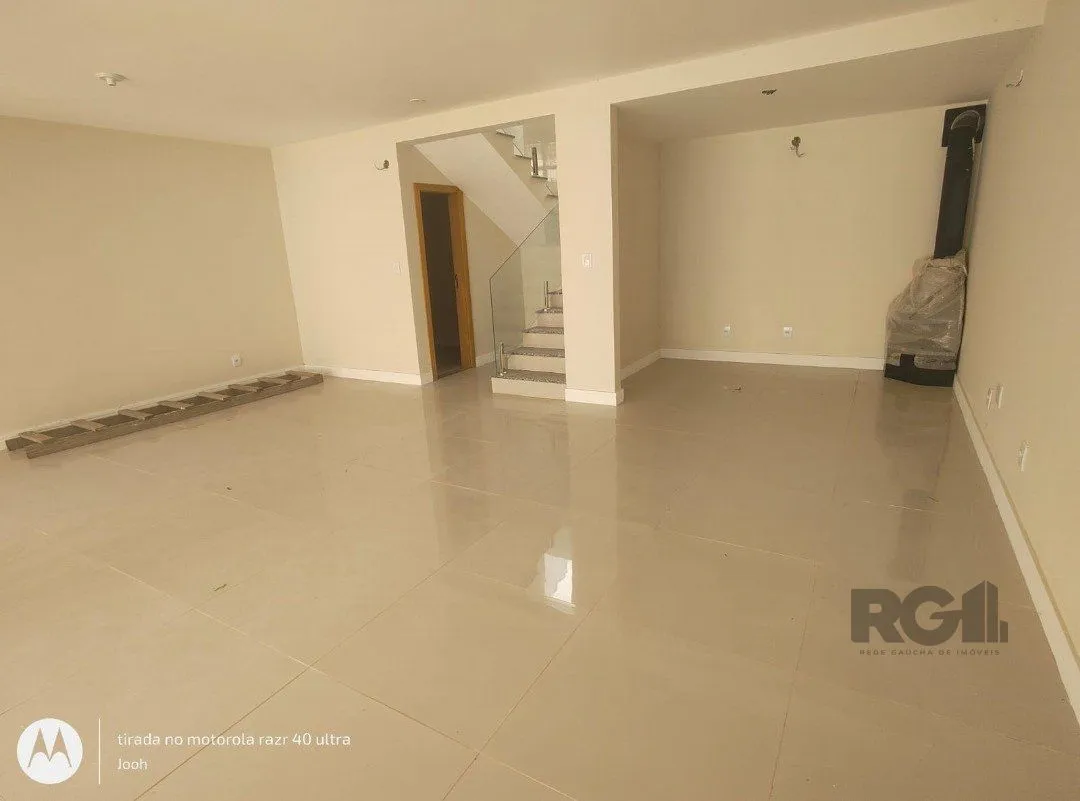 Imagem Casa em Condomínio fechado com 3 dormitórios no bairro Vila Nova em Porto Alegre, RS