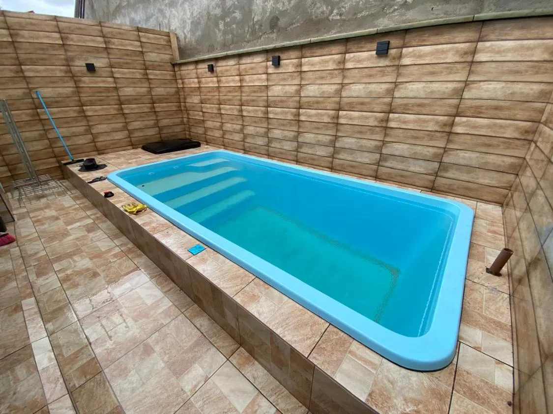 Imagem CASA NOVA COM PISCINA E ACEITA FINANCIAMENTO BANCÁRIO NO JARDIM JAMAICA EM ITANHAÉM