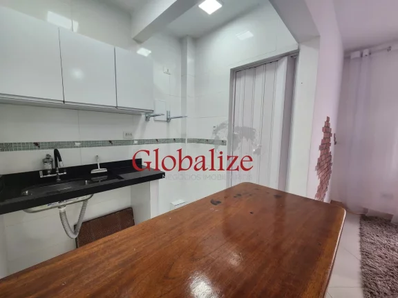 Imagem Sala Living a venda na Ponta da Praia, com 1 vaga por R$ 330.000,00