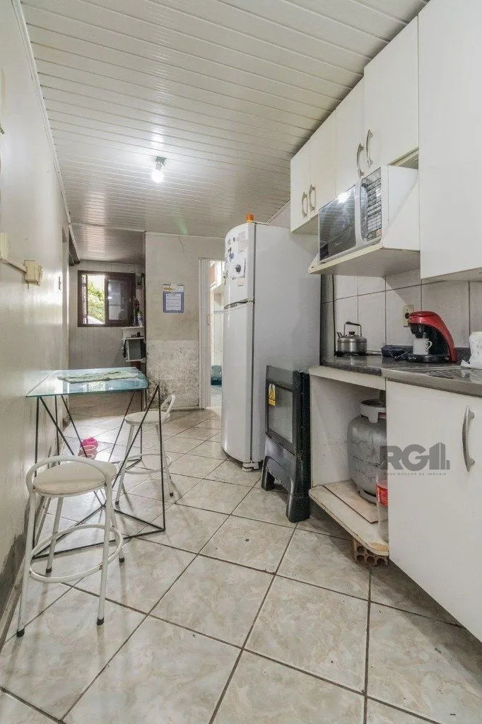 Imagem Casa de 4 dormitórios, no bairro Vila Jardim