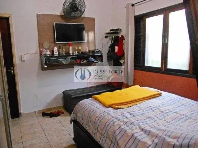 Imagem Casa com 2 suites 3 dormitorios 2 vagas na Aviação Praia Grande .