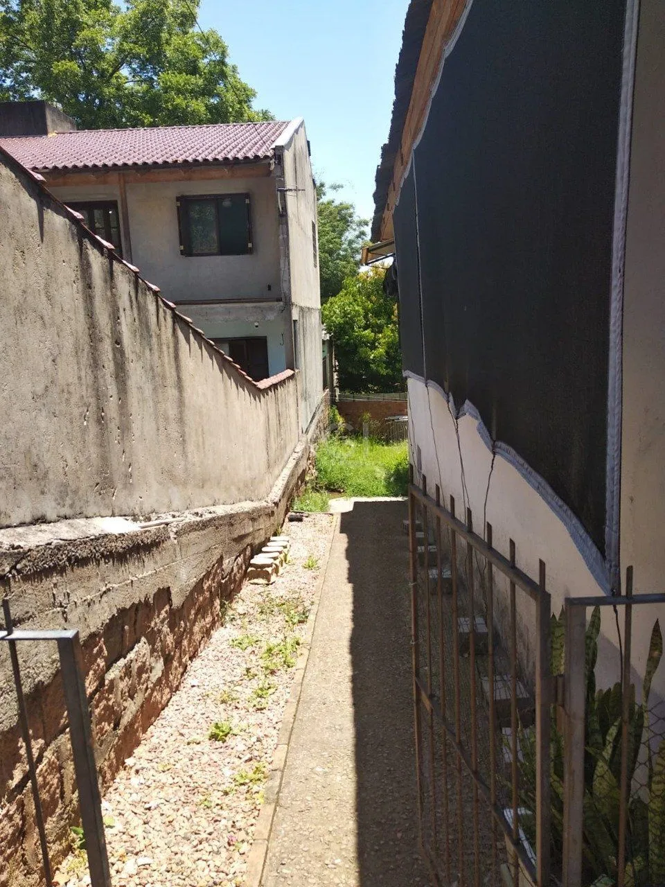 Imagem Casa 2 dormitórios, sala, banheiro garagem coberta, terreno 694m² bairro Camaquã, Porto Alegre/RS