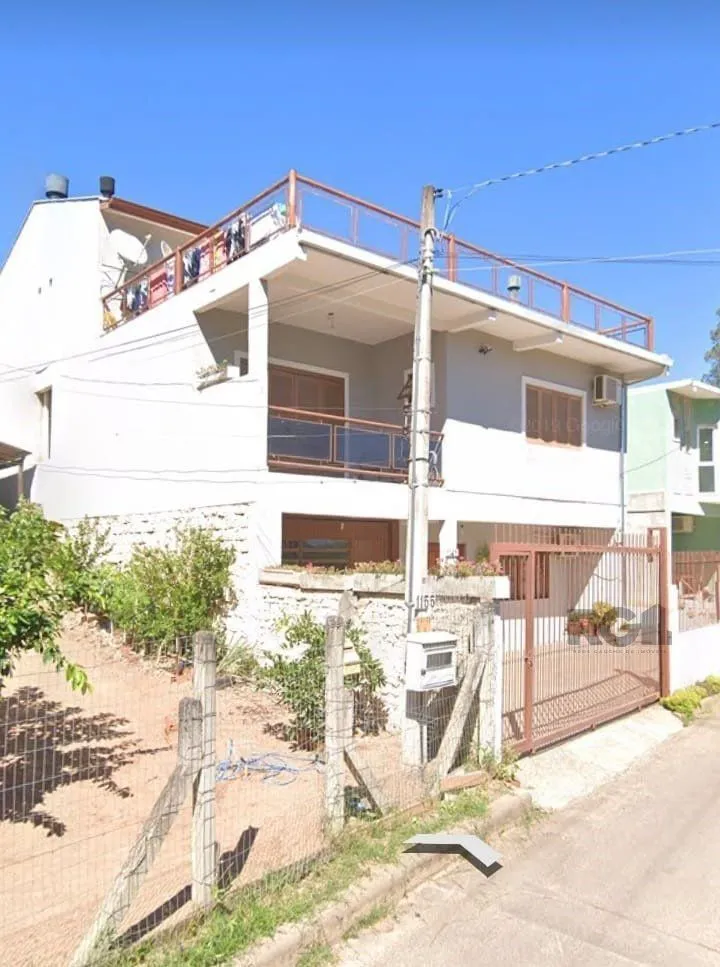 Imagem Casa com 4 dormitórios no bairro Vila Nova