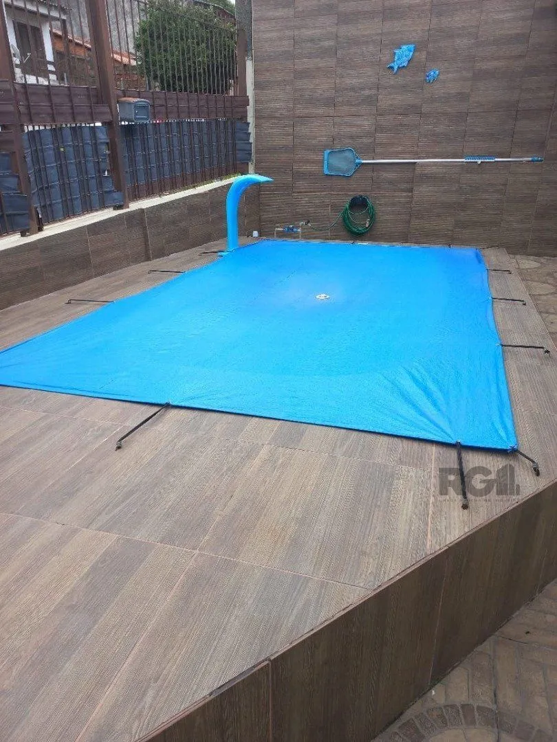 Imagem Casa 2 dormitórios com piscina na Vila Nova Porto Alegre