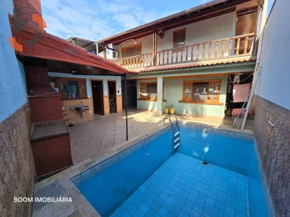 Foto do imóvel Casa com 4 dormitórios à venda, 243 m² por R$ 880.000,00 - Caonze - Nova Iguaçu/RJ