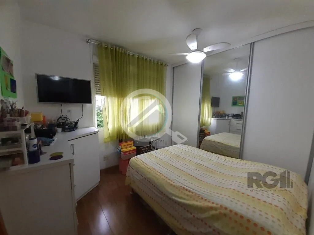 Imagem Apartamento de dois dormitórios sendo um suíte, living dois ambientes com churrasqueira, cozinha e...