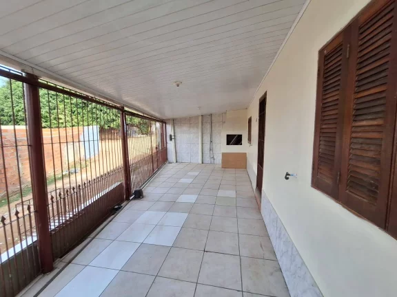 Imagem Casa com 91m², dois dormitórios, garagem, Lomba Tarumã, Viamão/RS.