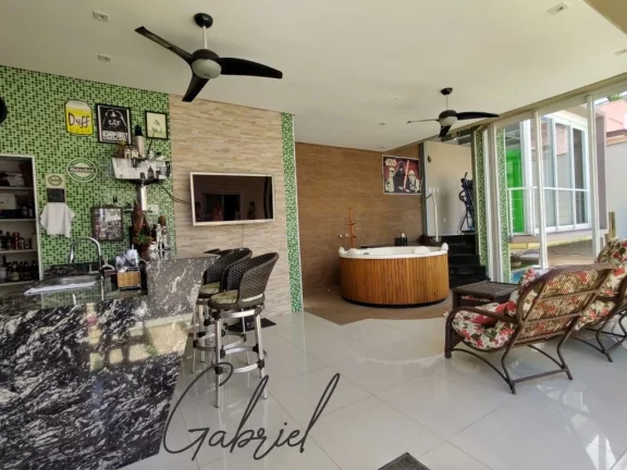 Imagem Casa de luxo em condomínio exclusivo em Vinhedo-SP: 3 quartos, 3 suítes, 3 salas, 6 banheiros, 5 vagas, 408 m². Venha conferir!