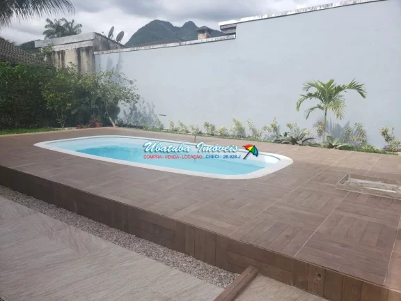 Imagem Excelente casa com piscina em condomínio fechado com 03 suítes