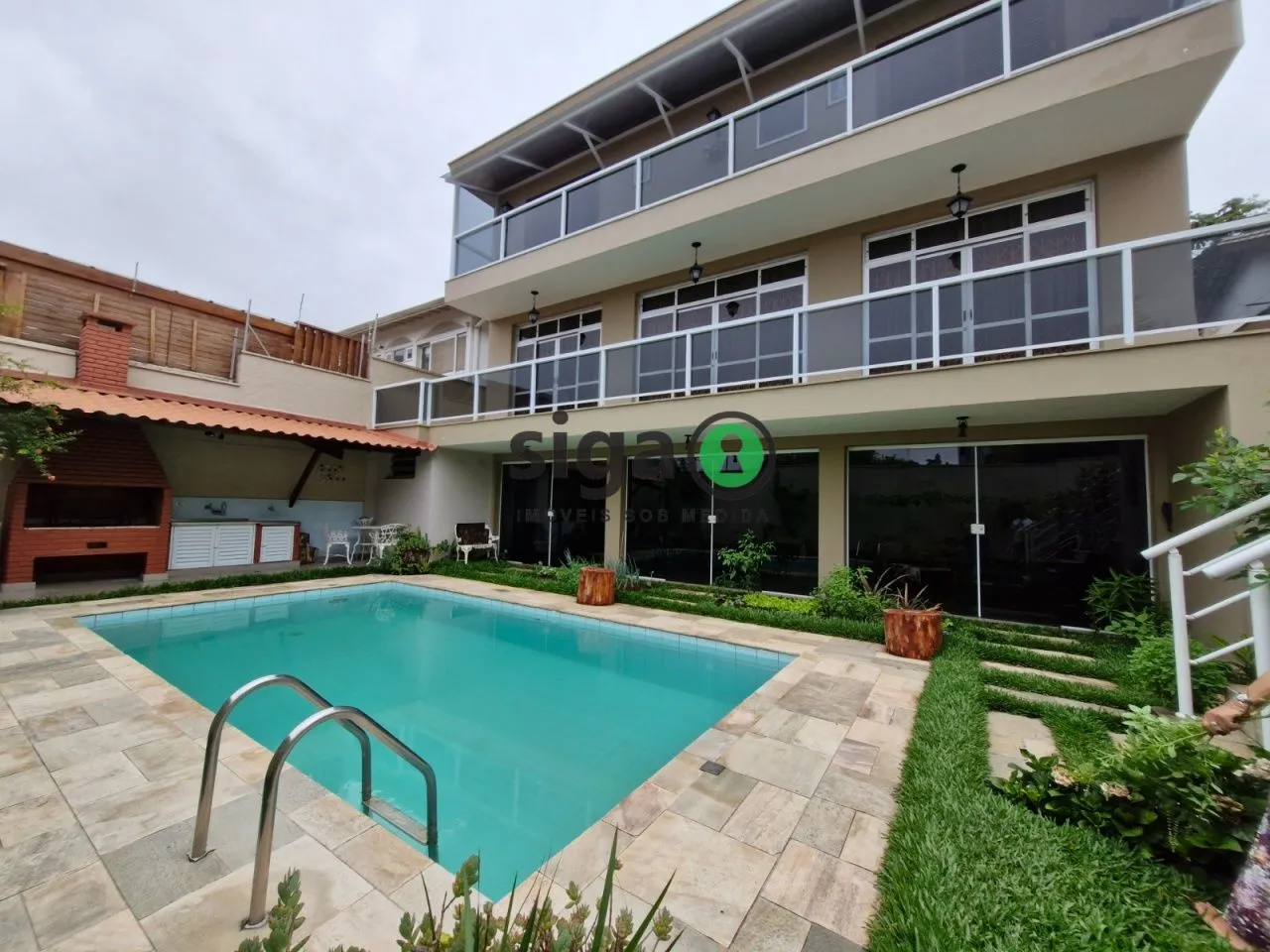 Foto do imóvel Casa de 5 dormitórios em condomínio no Real Parque
