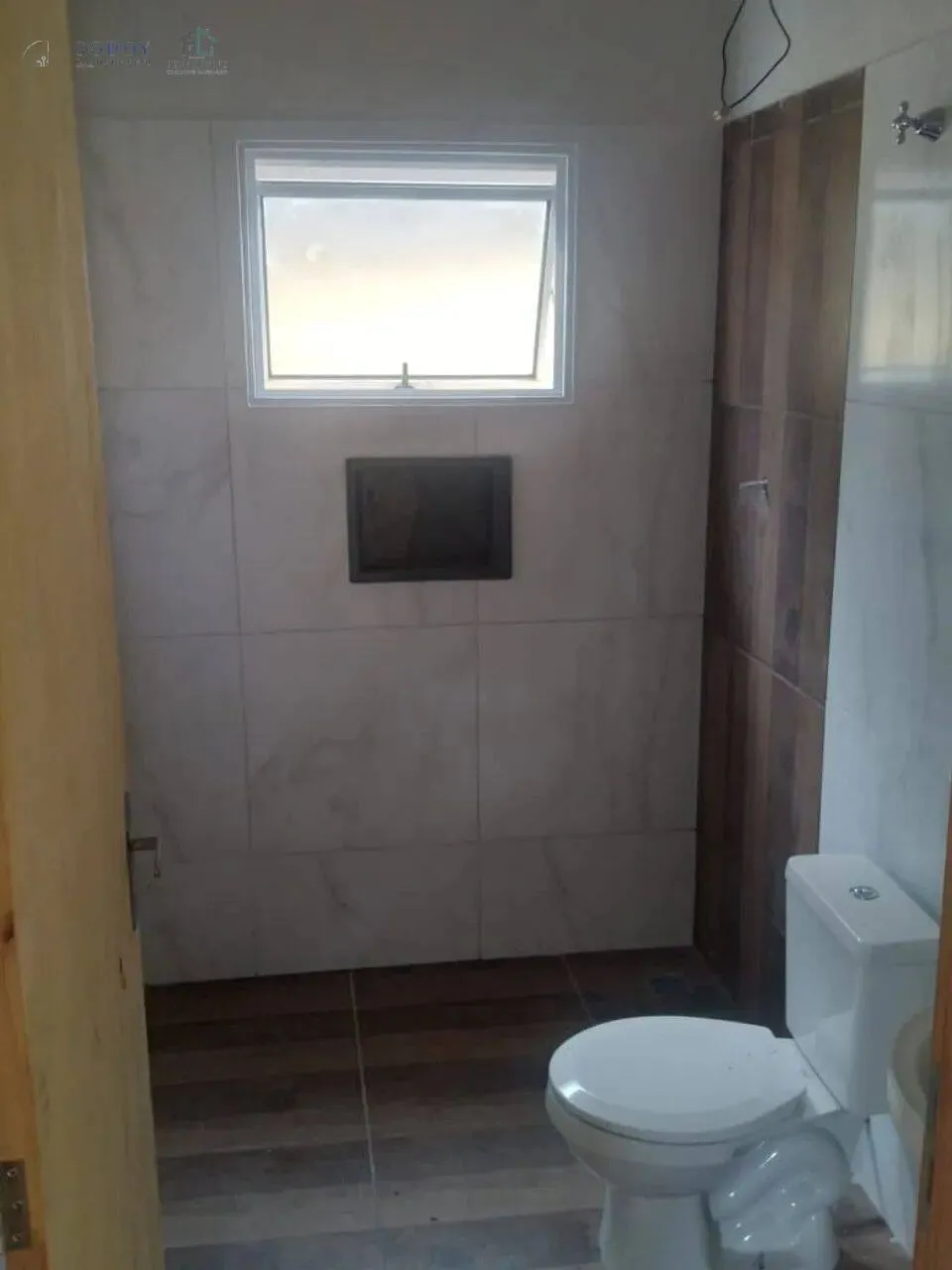 Imagem Casa Nova de Fundos em Excelente Localização