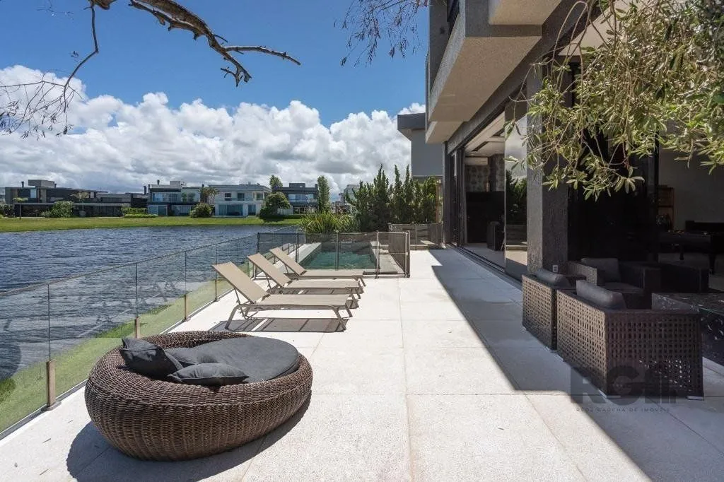Imagem Casa de Condomínio em Atlântida Sul