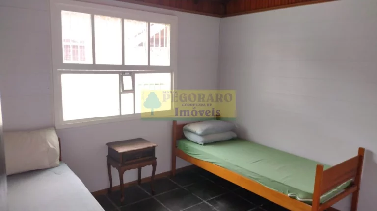Imagem Imperdível Casa de 4 Quartos na Prainha, Caraguatatuba-SP: 2 Suítes, 2 Salas, 4 Banheiros, 4 Vagas de Garagem!