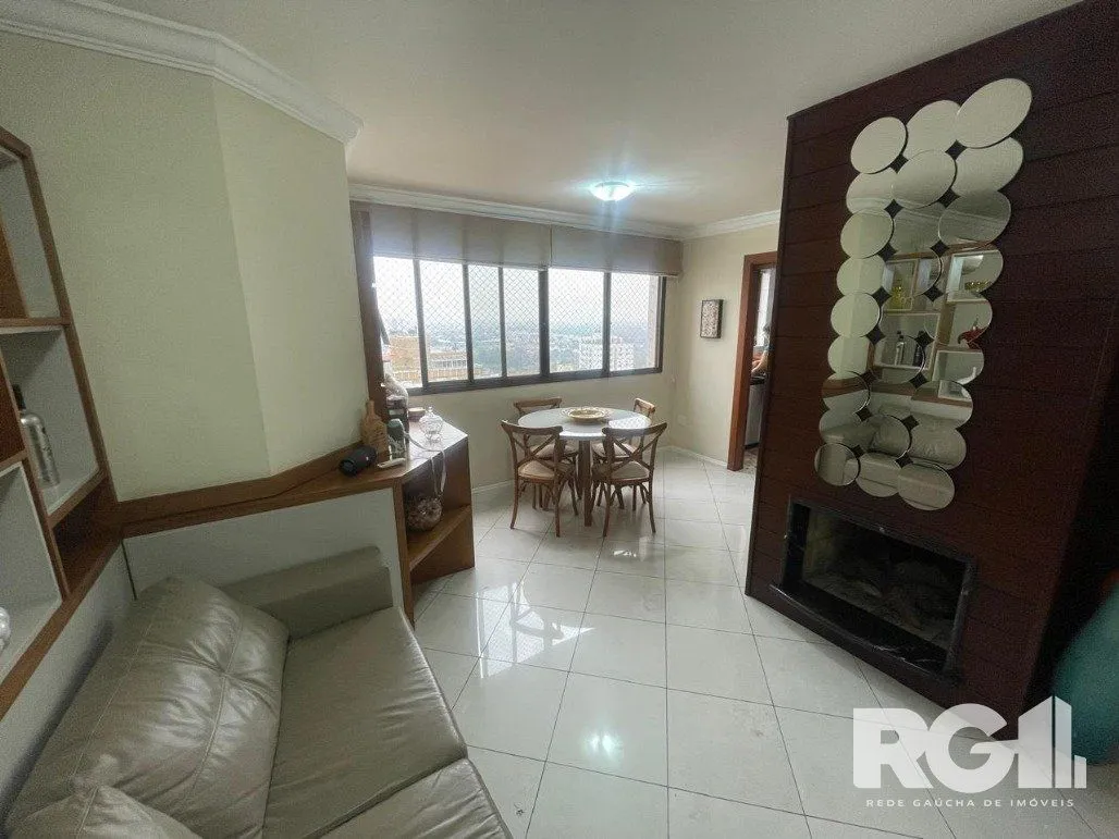 Imagem Apartamento com 3 dormitórios, 1 suíte, lavabo, 2 vagas cobertas, semimobiliado, churrasqueira e lareira.