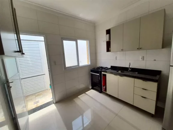 Imagem Casa com 2 dormitórios à venda, 70 m² por R$ 398.000 - Caiçara - Praia Grande/SP