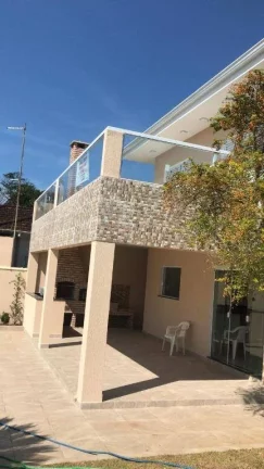Imagem Sobrado com 4 dormitórios à venda, 165 m² por R$ 1.300.000,00 - Solemar - Praia Grande/SP