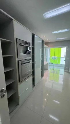 Imagem Apartamento frente mar mobiliado com 4 suítes e 3 vagas de garagem em Itapema