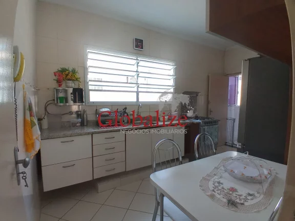 Imagem Sobreposta a venda com garagem para três carros e moto com três dormitórios no bairro do Marapé em Santos por R$ 855.000,00