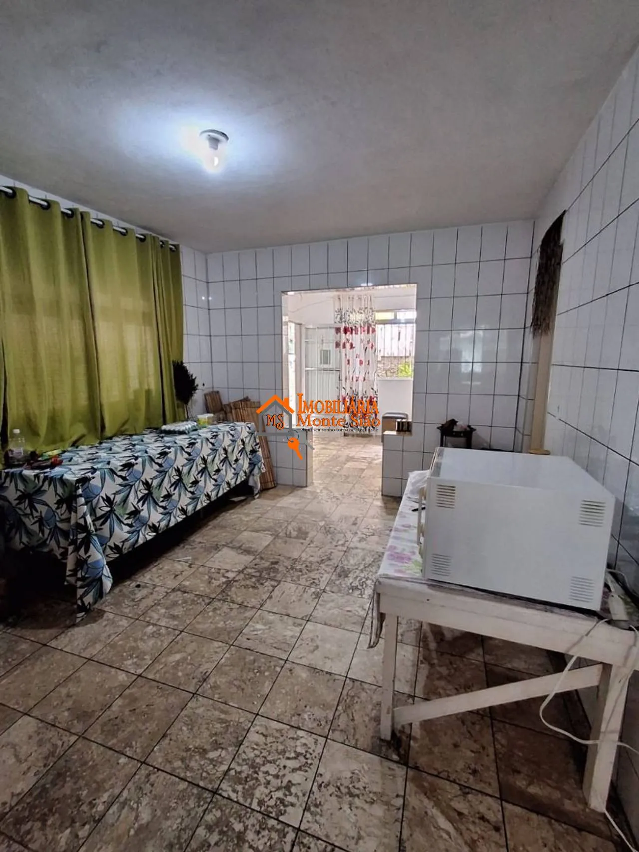 Foto do imóvel Casa com 3 dormitórios à venda, 310 m² por R$ 650.000,00 - Picanco - Guarulhos/SP
