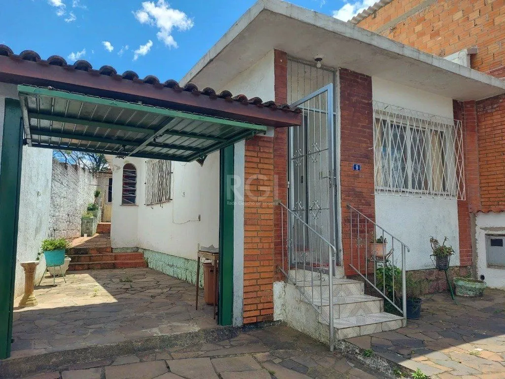 Imagem CASA COM CHURRASQUEIRA E GARAGEM PARA 2 CARROS