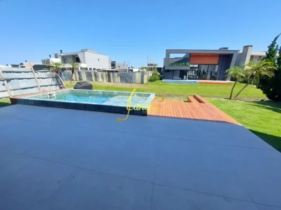 Imagem Sobrado beira de lago com 05 suítes piscina mobiliado e decorado