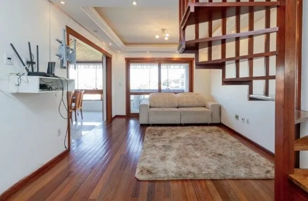 Imagem Linda cobertura de 4 dormitórios,1 suíte , 4 banheiros para venda, 4 vagas de garagens cobertas e escrituradas, 1 terraço com deck, piscina e churrasqueira no bairro Jardim Lindóia em Porto Alegre/RS.