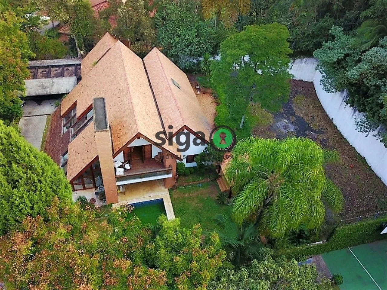 Foto do imóvel Casa de Luxo Projetada por Marcos Tomanik no Morumbi - Vizinha a Área Verde Tombada