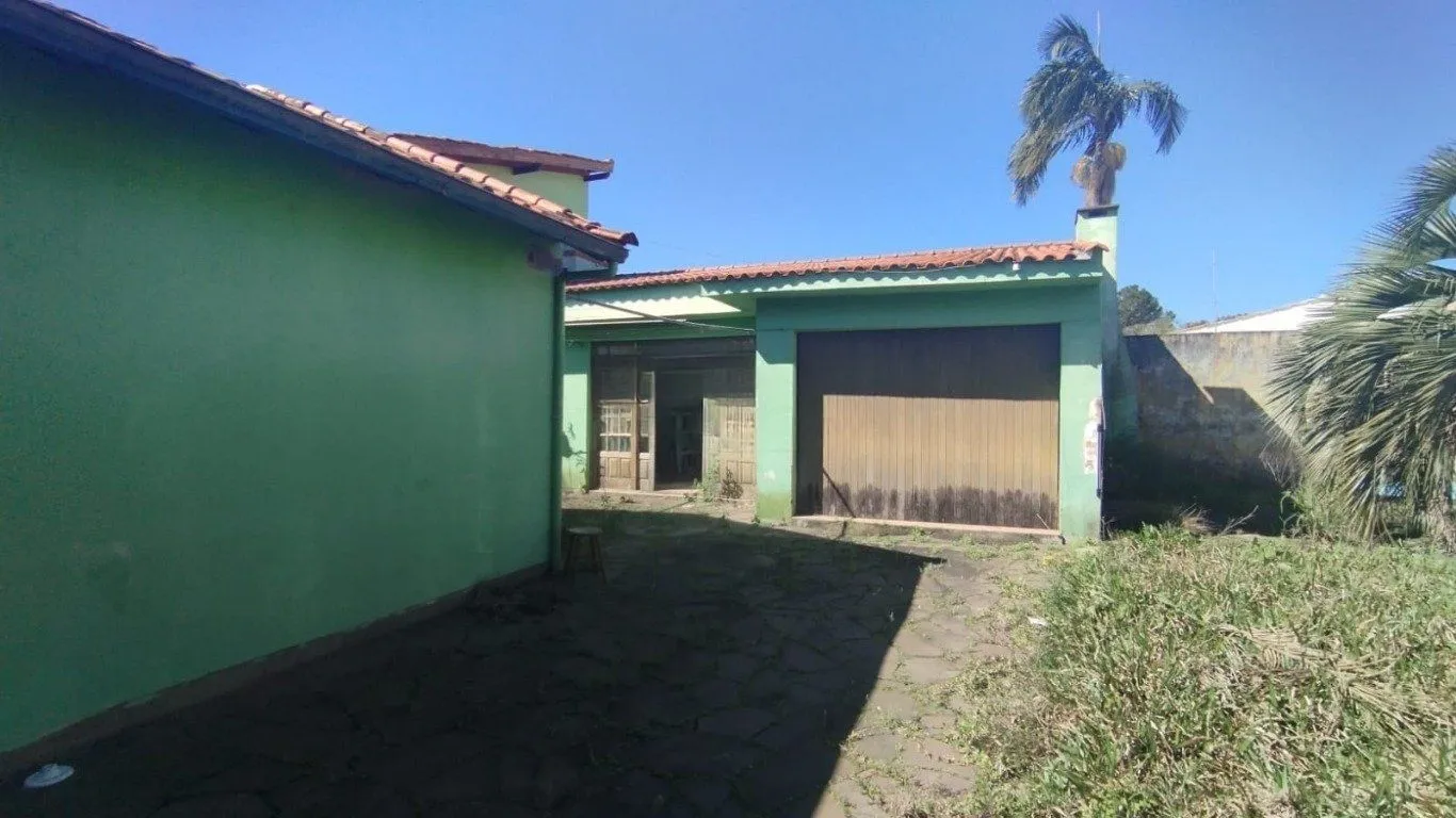 Imagem Casa com 4 quartos e 257m² à venda em Guarujá, Porto Alegre.
