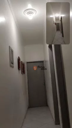 Imagem Casa com 2 dormitórios à venda, 64 m² por R$ 390.000 - Vila Caiçara - Praia Grande/SP