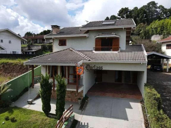 Imagem Casa com 3 dormitórios à venda, 285 m² por R$ 1.250.000,00 - Jardim Toriba - Campos do Jordão/SP