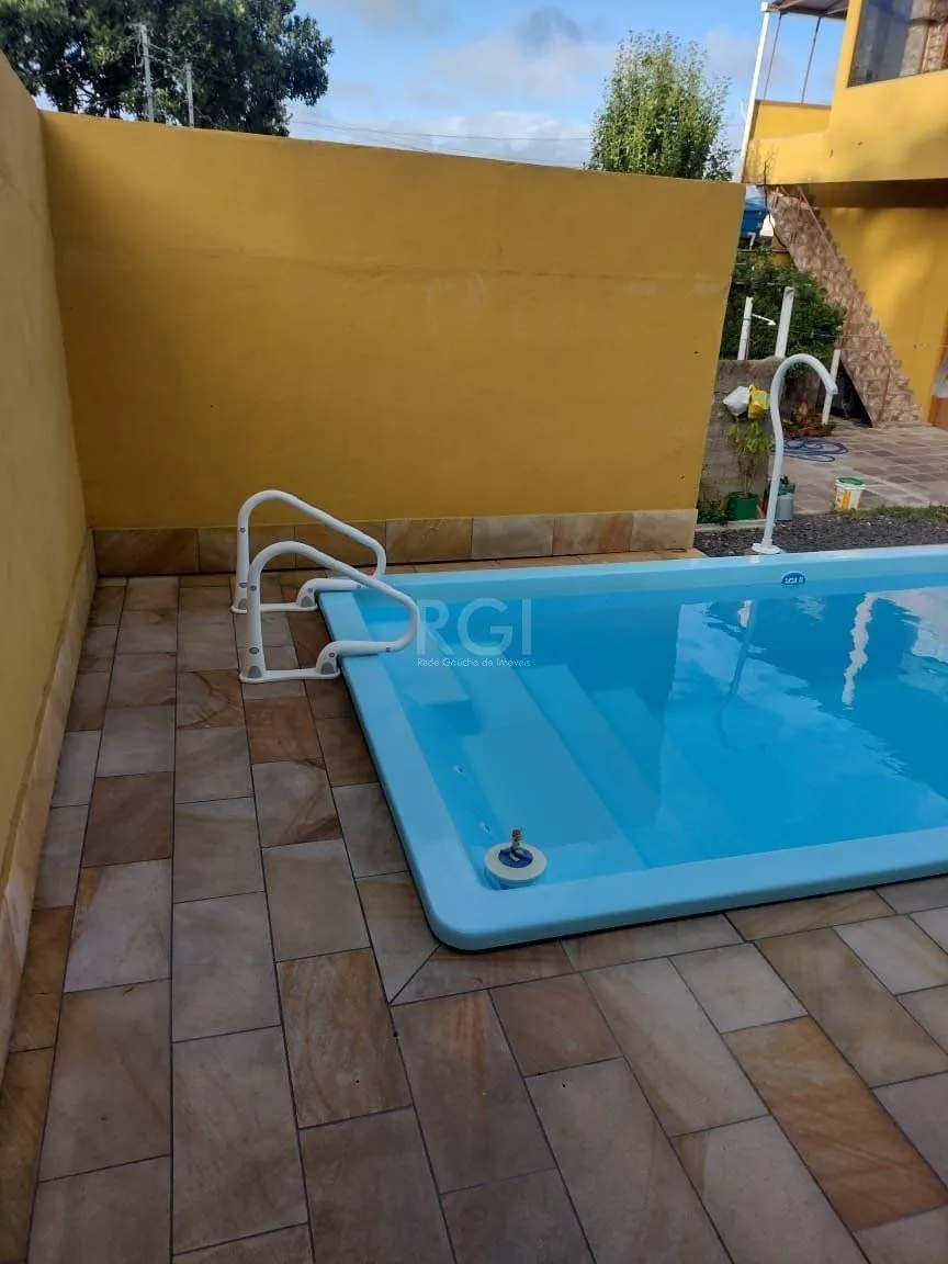 Imagem Casa para Venda - 0.18m², 2 dormitórios, sendo 2 suites, 3 vagas - Lomba do Pinheiro