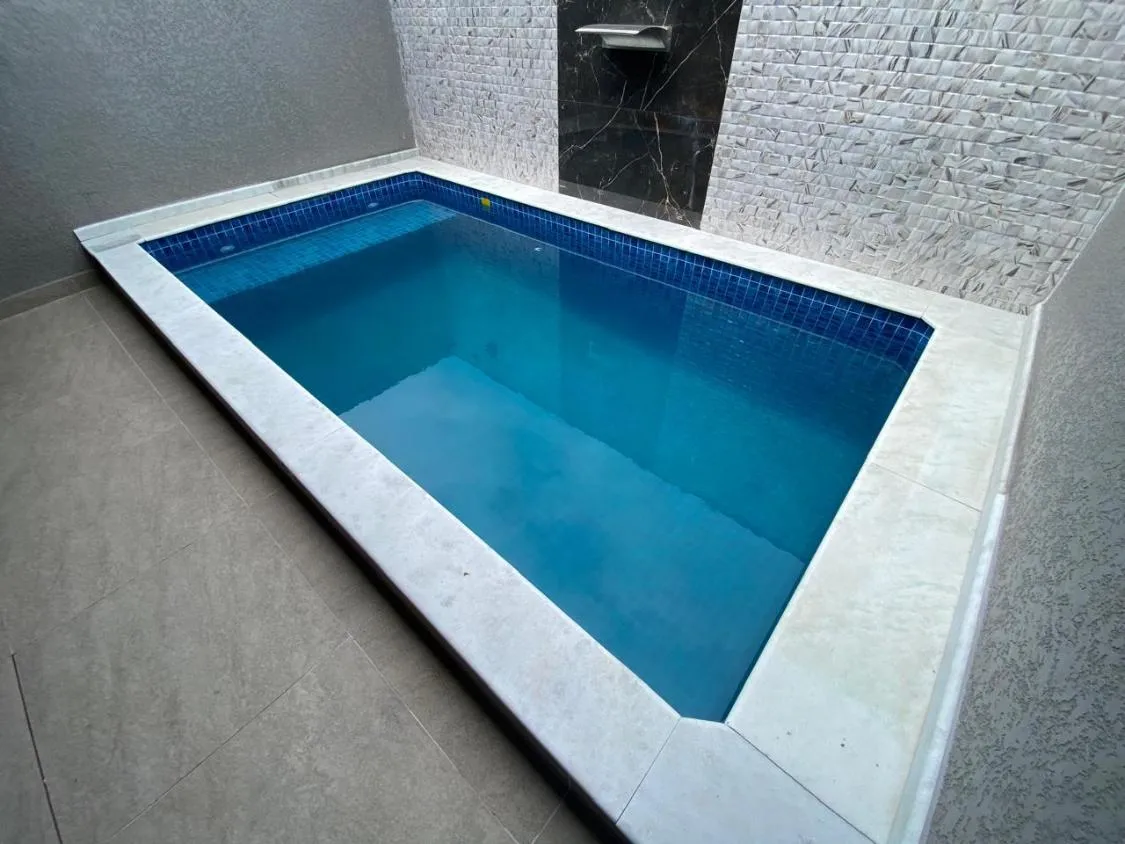 Imagem LINDA CASA NOVA COM PISCINA NO VERDE MAR