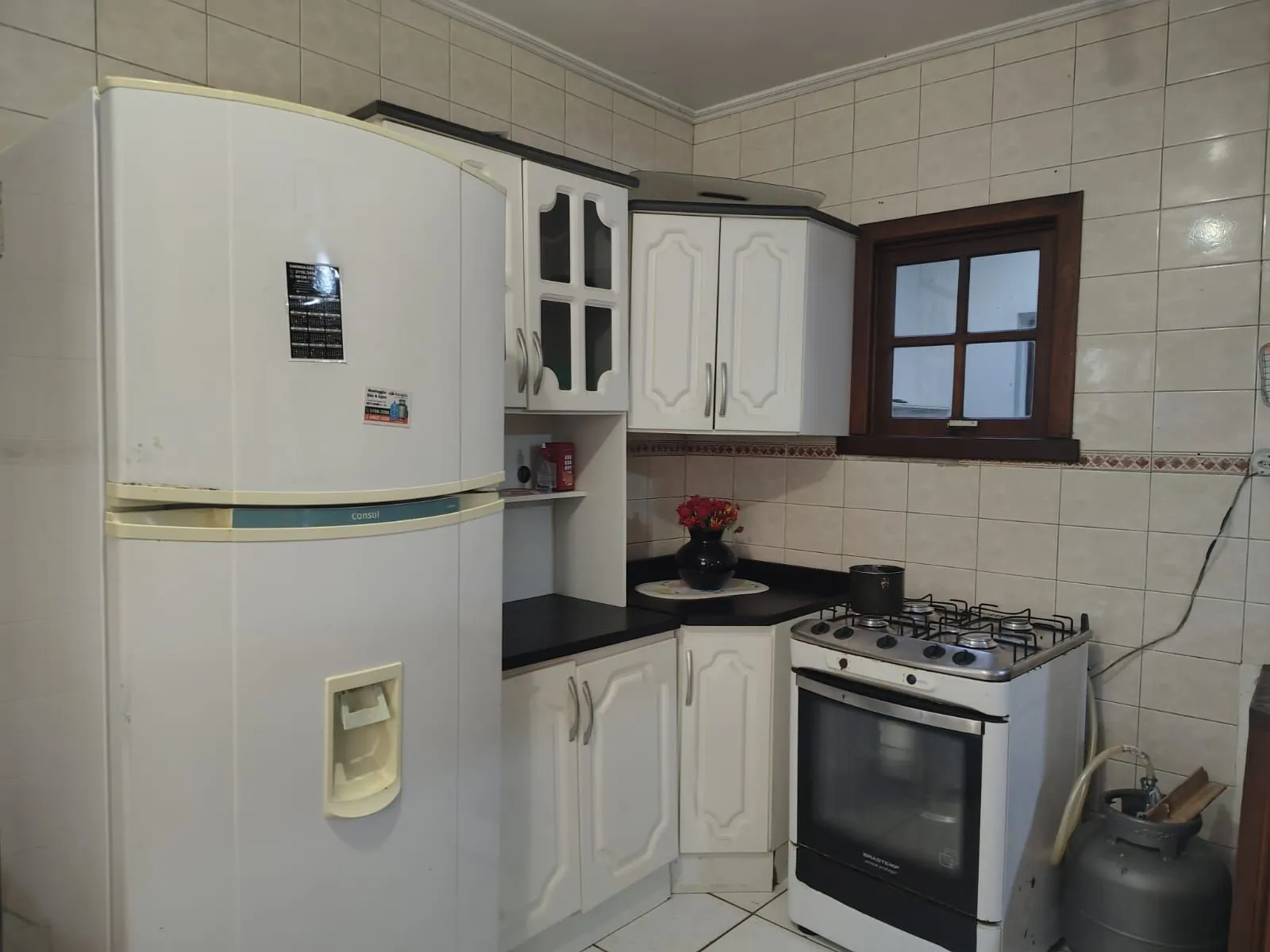 Imagem Casa de 4 dormitórios, 1 suíte e 4 vagas de garagem no bairro Cavalhada.