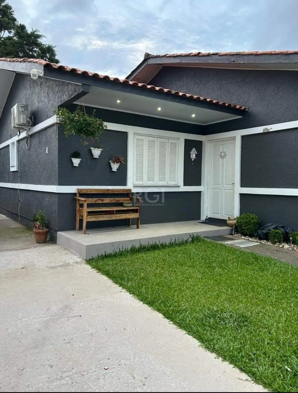 Imagem Casa no bairro Hípica - 4 dormitórios