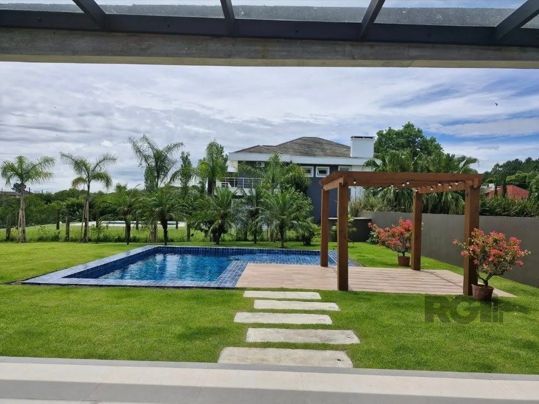 Imagem Casa térrea com piscina, no Condominio Terra Ville com 380,27m2 e 3 suites.