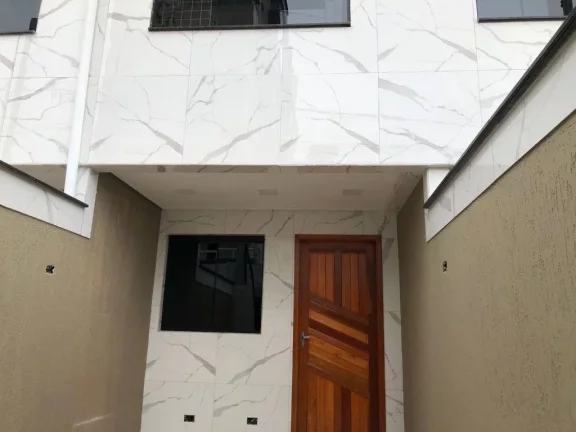 Imagem Sobrado com 2 dormitórios à venda, 60 m² por R$ 390.000,00 - Caiçara - Praia Grande/SP