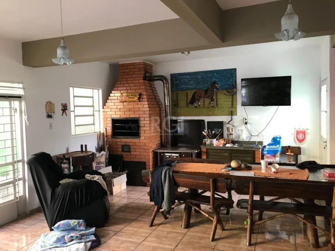 Imagem Casa residencial/comercial, com 350m² privativos, 4 quartos, 5 vagas de garagem - Bairro Tristeza