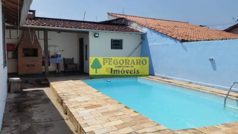 Imagem Casa com Piscina à venda na Prainha Caraguatatuba, 2 quartos, 1 suíte, 1 sala, 3 banheiros, 2 vagas