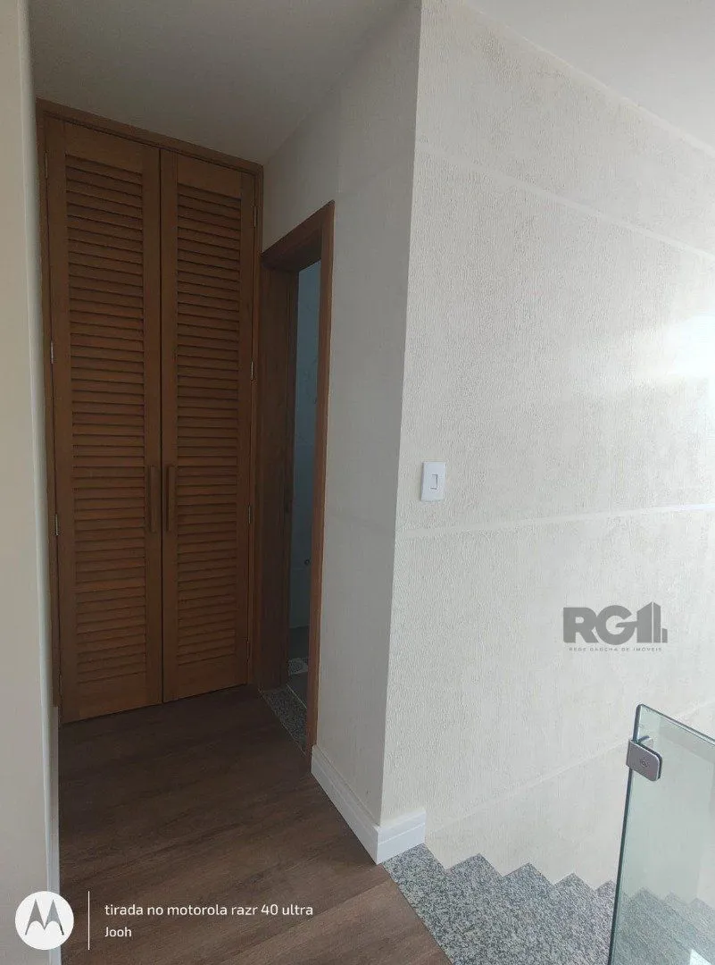 Imagem Casa em Condomínio fechado com 3 dormitórios no bairro Vila Nova em Porto Alegre, RS