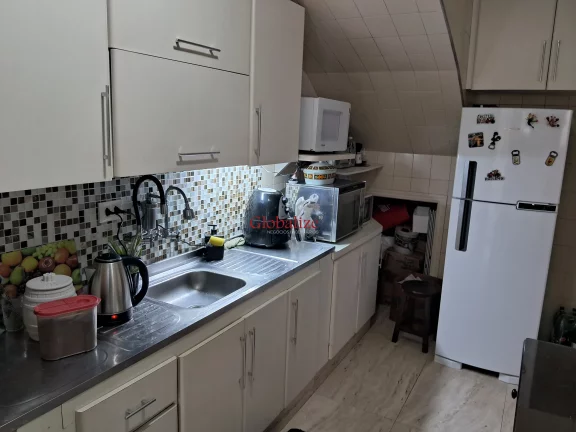 Imagem Sobrado para reforma em Santos na Vila Belmiro com 2 dormitórios, garagem e quintal nos fundos com piscina à venda por R$ 1.365.000,00