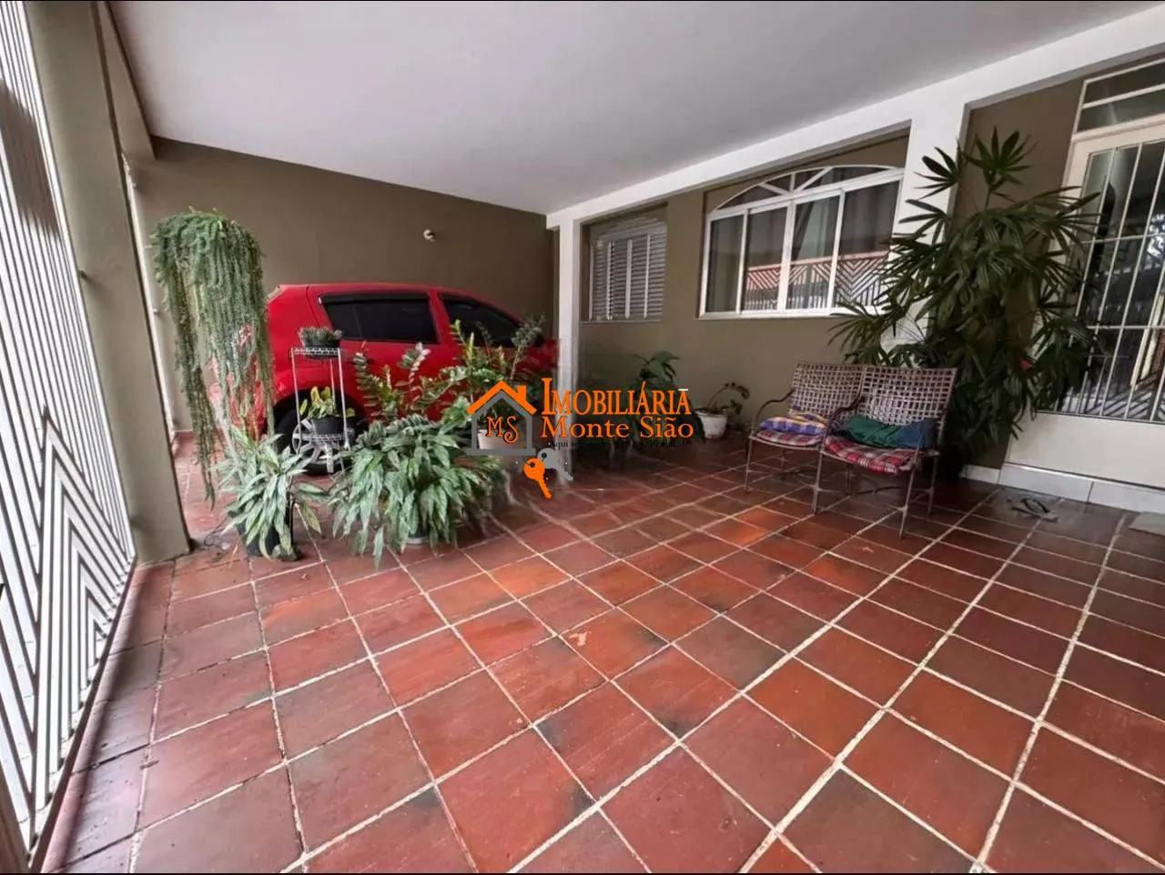 Foto do imóvel Casa com 3 dormitórios à venda, 150 m² por R$ 680.000,00 - Jardim Nova Taboão - Guarulhos/SP