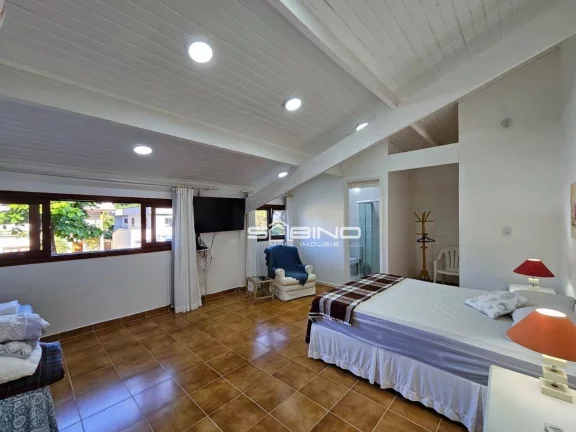 Imagem Casa à venda com 4 dormitórios 2 suítes 275m² de área útil, na Riviera de São Lourenço - Bertioga SP