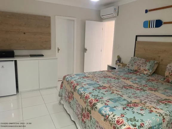 Imagem Casa de Luxo em Condomínio: 4 Quartos, 2 Suítes, 2 Salas, 2 Banheiros, 2 Vagas de Garagem em Buraquinho - Lauro de Freitas-BA.